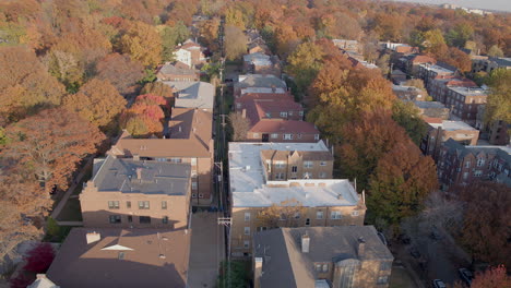 Aerial-over-apartment-buildings-on-a-pretty-day-in-Autumn-with-trees-at-peak-color-tracking-left-to-Wydown-boulevard