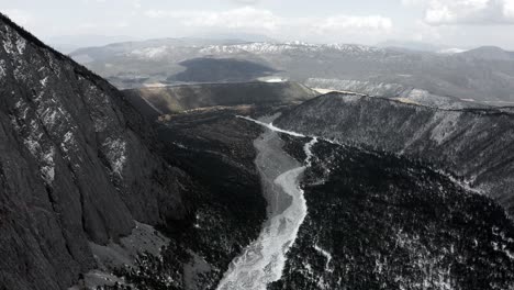 Aerial:-historical-glacier-riverbed-valley-in-Yulong,-Jade-Dragon-mountain-China