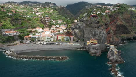 Serene-scenery-with-calm-blue-water-at-idyllic-coast-of-Madeira,-aerial
