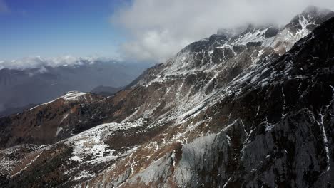 Shanzidou-mountain-in-Jade-Dragon-Snow-Mountain-massif,-Yunnan-China,-4K-aerial