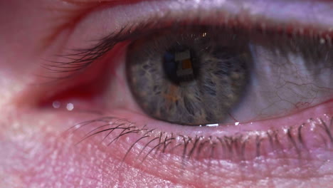 Macro-Shot-Of-A-Person's-Eye-With-Reflection-Of-Mobile-Phone-Screen