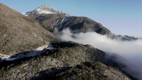 Amazing-Shanzidou-Chinese-mountain-peak,-Jade-Dragon-Mountain,-cloudy-aerial