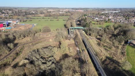 Drone-tracking-train-near-Bishop-Stortford-countryside-in-background