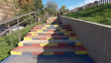 Colourful-Urban-Stairwell-in-Tirana's-City-center-in-Albania---Wide-push-in-gimbal-shot