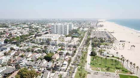 High-aerial-view-above-Los-Angeles-California-beach-waterfront-neighbourhood-city-landscape
