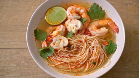 noodles-with-spicy-soup-and-shrimps-in-white-bowl---Asian-food-style