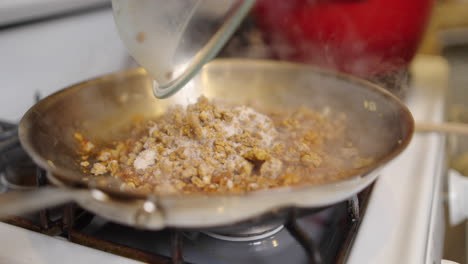 Making-homemade-vegan-chorizo-with-crumbled-garbanzo-beans-and-special-spices---slow-motion