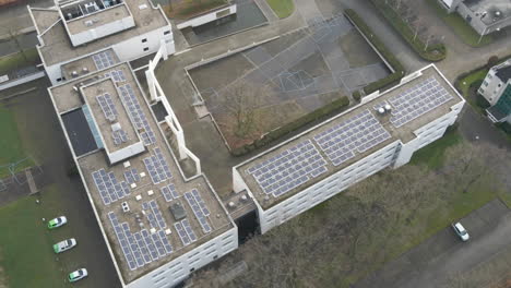 Aerial-of-solar-panels-on-office-building-rooftop---crop