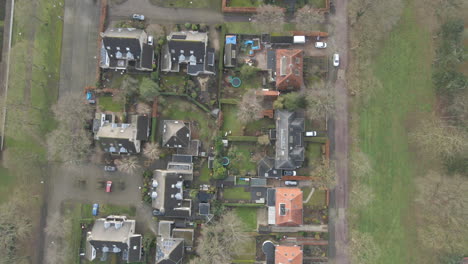 Top-down-aerial-of-rows-of-houses-in-a-rural-area