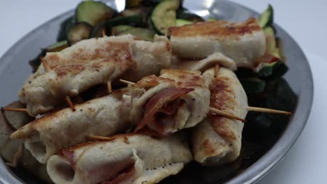 Chicken-rolls-with-zucchini-in-a-silver-tray