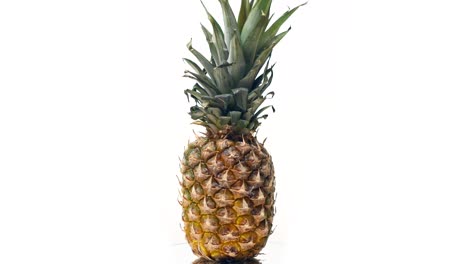 Pineapple-rotating-on-a-white-background