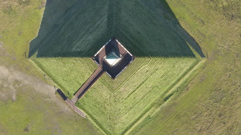 Wide-aerial-of-Austerlitz-Pyramid-surrounded-by-forest