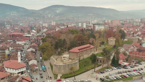 Aerial-view-of-the-Novi-Pazar-Fortress-in-the-city-of-Novi-Pazar,-Raska-district,-Serbia-on-foggy-day