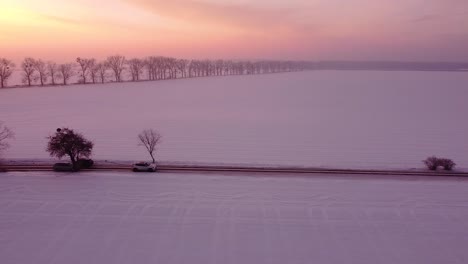 Rural-road-through-countryside-at-sunrise