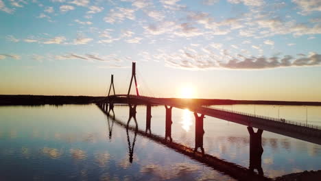Aerial-view-of-Replot-Bridge-of-Finland,-Connecting-the-island-of-Replot-with-the-mainland-in-Korsholm,-Sunset