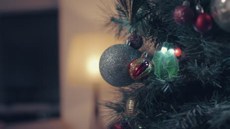 Various-Ornament-Balls-Hang-On-Fir-Tree-With-Bokeh-Lights-Background-At-Christmas-Night