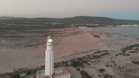 Aerial-view-of-Cape-Trafalgar-lighthouse-at-sunset