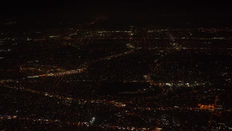 landing-in-large-city-at-night