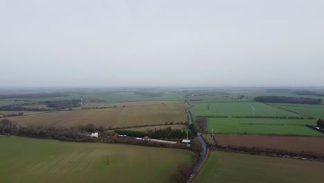 Drone-footage-over-a-quiet-country-road-in-Kent,-England