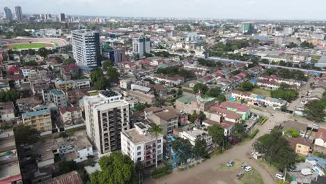 Drone-Aerial-View-of-Nairobi,-Kenya,-West-Neighborhood-Area-and-Downtown-Skyline-on-Sunny-Day,-60fps-Drone-Shot