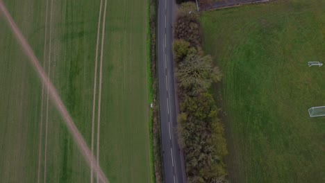 Drone-footage-of-a-country-road-in-Aylesham,-Kent,-UK