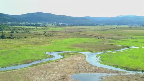 Aerial-View-Over-Intermittent-Lake-At-Lake-Cerknica-In-Slovenia