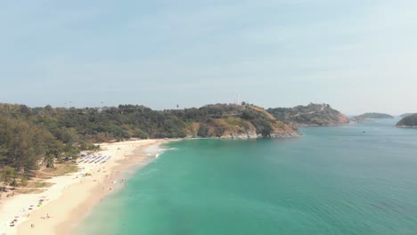 Wide-establishing-view-over-Nai-Harn-golden-Beach-in-southern-Phuket---Aerial-wide-Panoramic-shot
