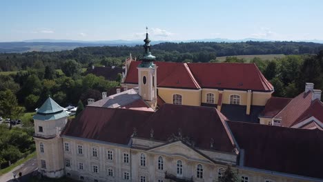 Drone-is-flying-over-by-a-Church-tower-from-above