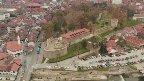 Novi-Pazar-historical-city-and-old-walled-city-ruins-in-Serbia,-aerial-view