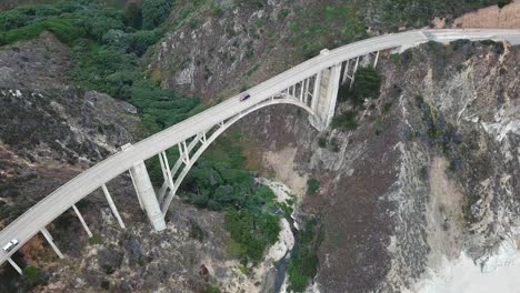 Bixby-Canyon-Bridge-and-beach-seen-from-drone,-California