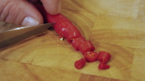 Motion-controlled-shot-of-cutting-a-pepperoni