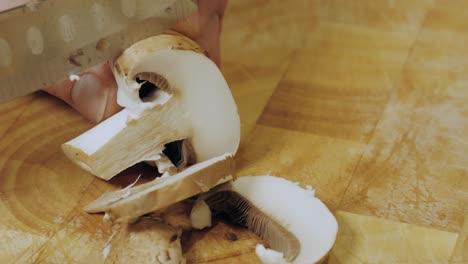 Motion-controlled-shot-of-cutting-a-mushroom