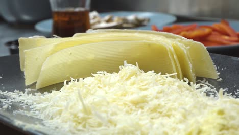 Grated-cheese-on-a-gray-tray