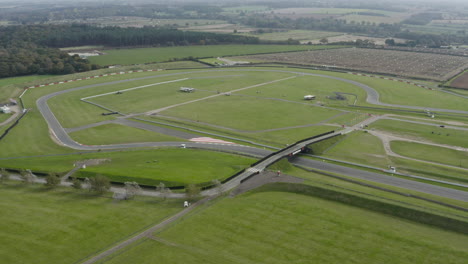 Race-circuit-in-amongst-green-fields-and-trees-in-the-countryside
