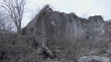 Collapsed-abandoned-concrete-silo.-Panning-shot