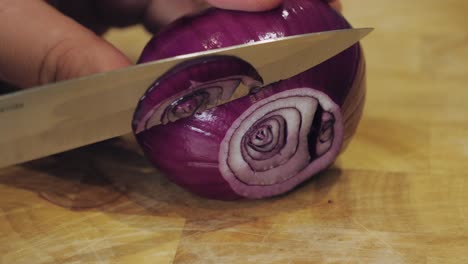 Motion-controlled-slow-motion-shot-of-cutting-an-onion