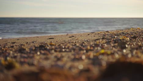Sand-and-pebbles-at-the-beach-with-selective-focus