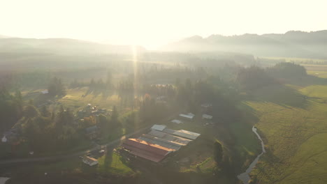 Aerial-circling-right-shot-over-farms-during-sunset