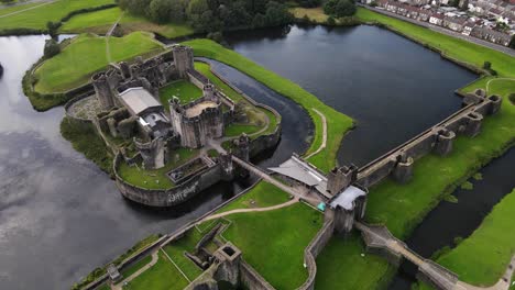 Caerphilly-Castle-lake-and-stone-wall-elaborate-defense-system-aerial-view