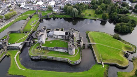 Aerial-view-of-Caerphilly-Castle,-United-Kingdom-on-sunny-summer-day