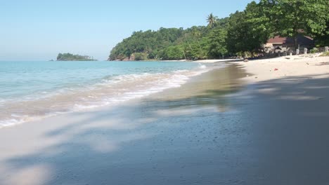 empty-white-sand-beach-on-Koh-Chang-Thailand-with-islands-in-background