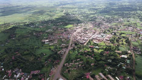Small-Valley-Town-Under-Kilimanjaro-Kenya,-Aerial-View-of-Loitokitok-Near-Border-With-Tanzania,-60fps-Drone-Shot