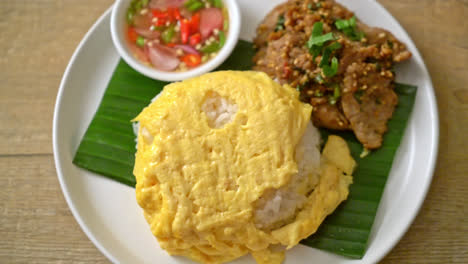 egg-on-topped-rice-with-grilled-pork-and-spicy-sauce