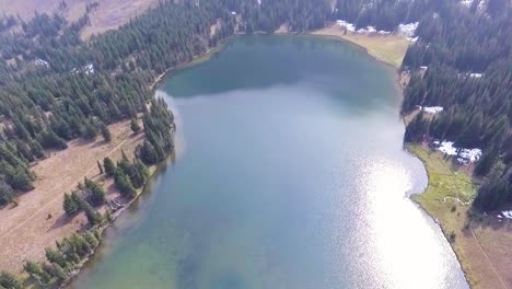 Camera-tilts-up-revealing-the-beautiful-lake-shoreline