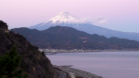 Beautiful-Pink-and-purple-sky-with-Mount-Fuji-and-ocean---high-above-view