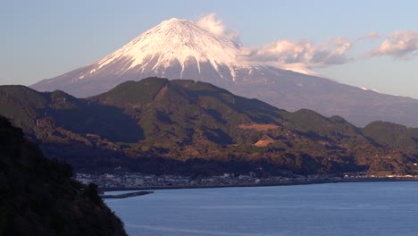 Incredible-view-out-towards-Mont-Fuji,-ocean-and-small-fishing-town