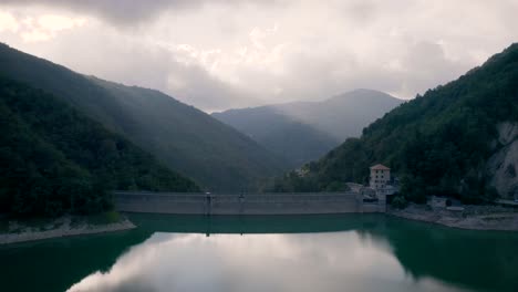 drone-shot-reveal-an-artificial-lake-near-Genova,-Liguria,-Italy
