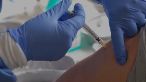 Close-up-of-a-person-receiving-the-COVID-vaccine
