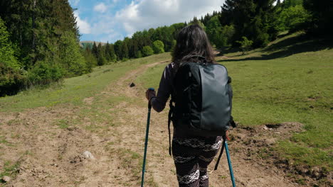 a-woman-hiking-on-a-mountain