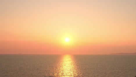 Orange-Evening-Sunset-Sun-Above-Calm-Sea